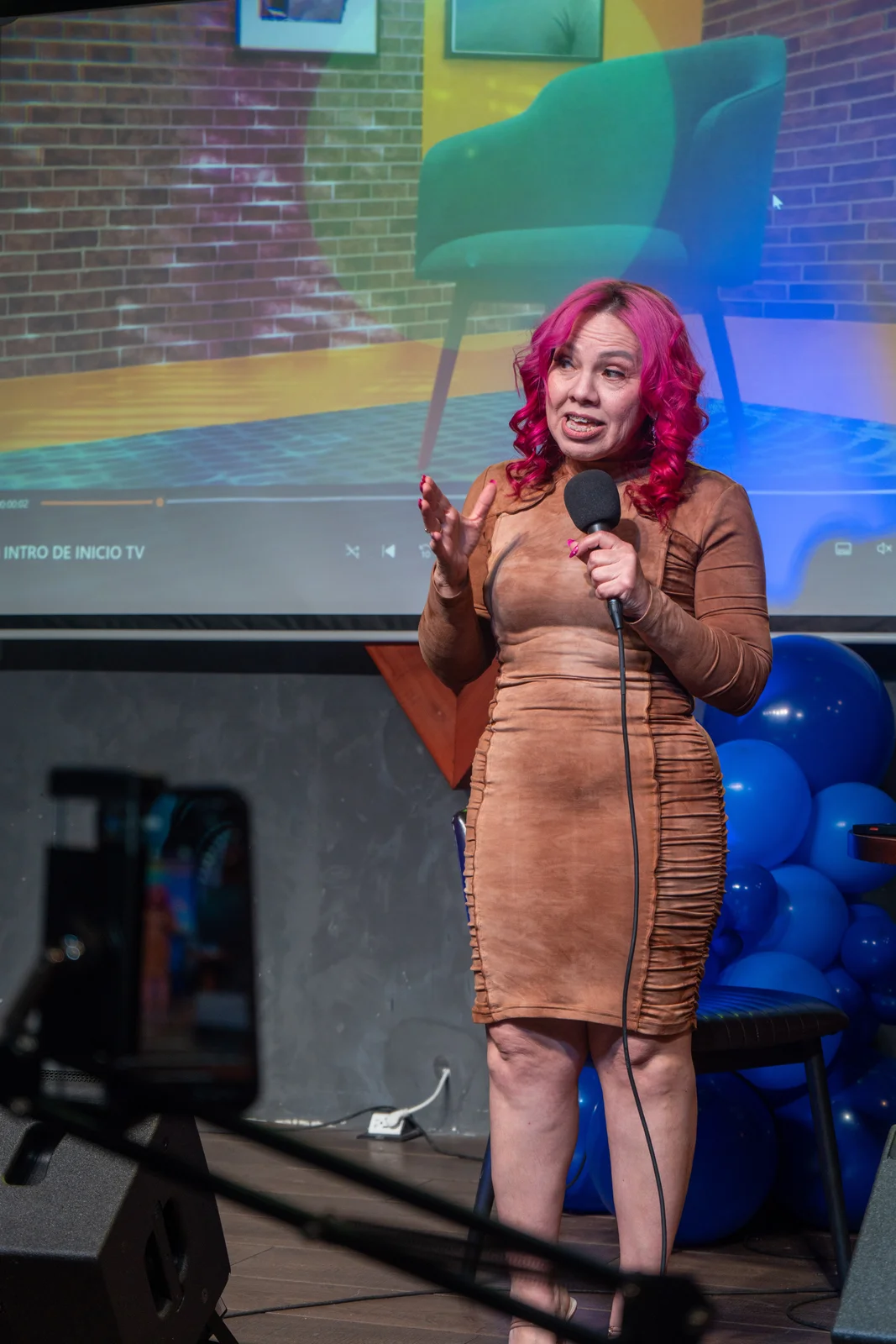 Creator speaking on stage