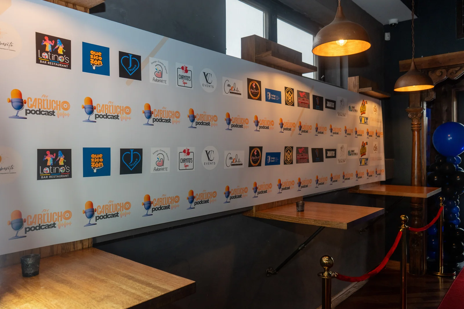 Sponsor wall at a podcast event
